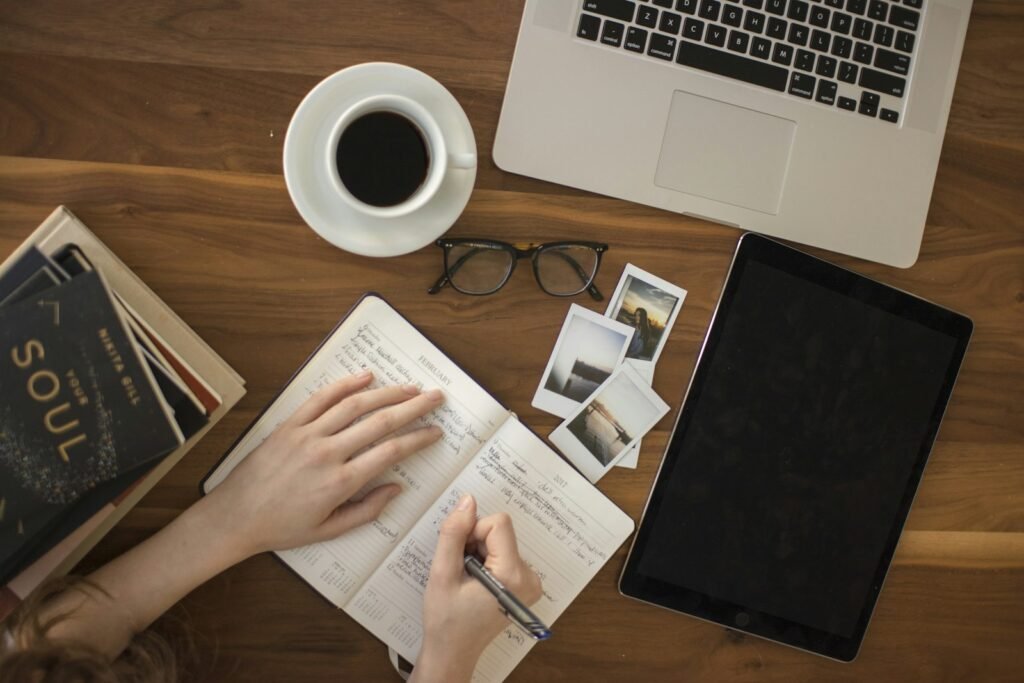Study desk with open textbooks and notebook representing exam revision